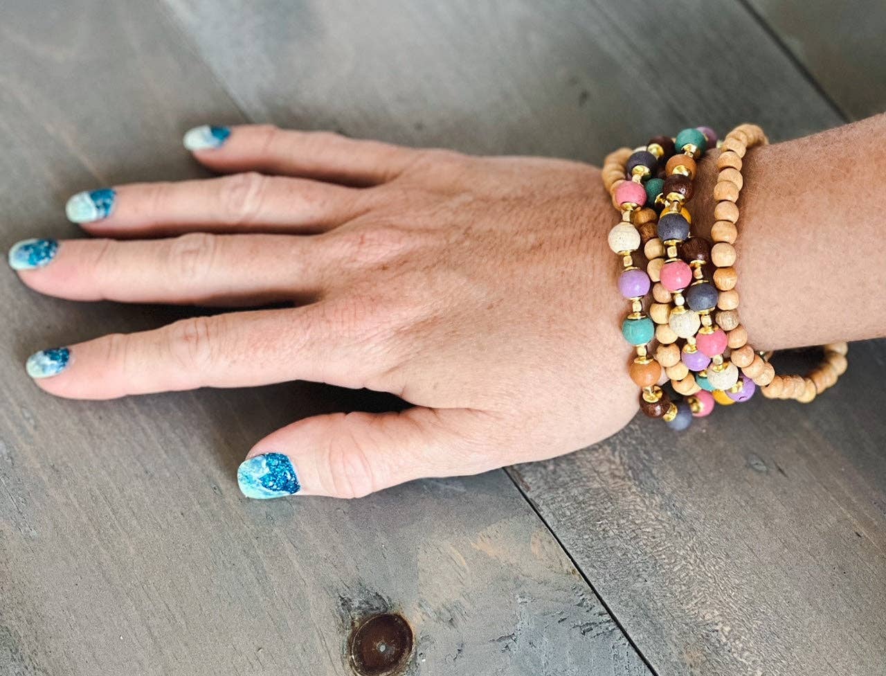 Set of 5 Wood Beaded Stretch Bracelet With Gold Tone Accents